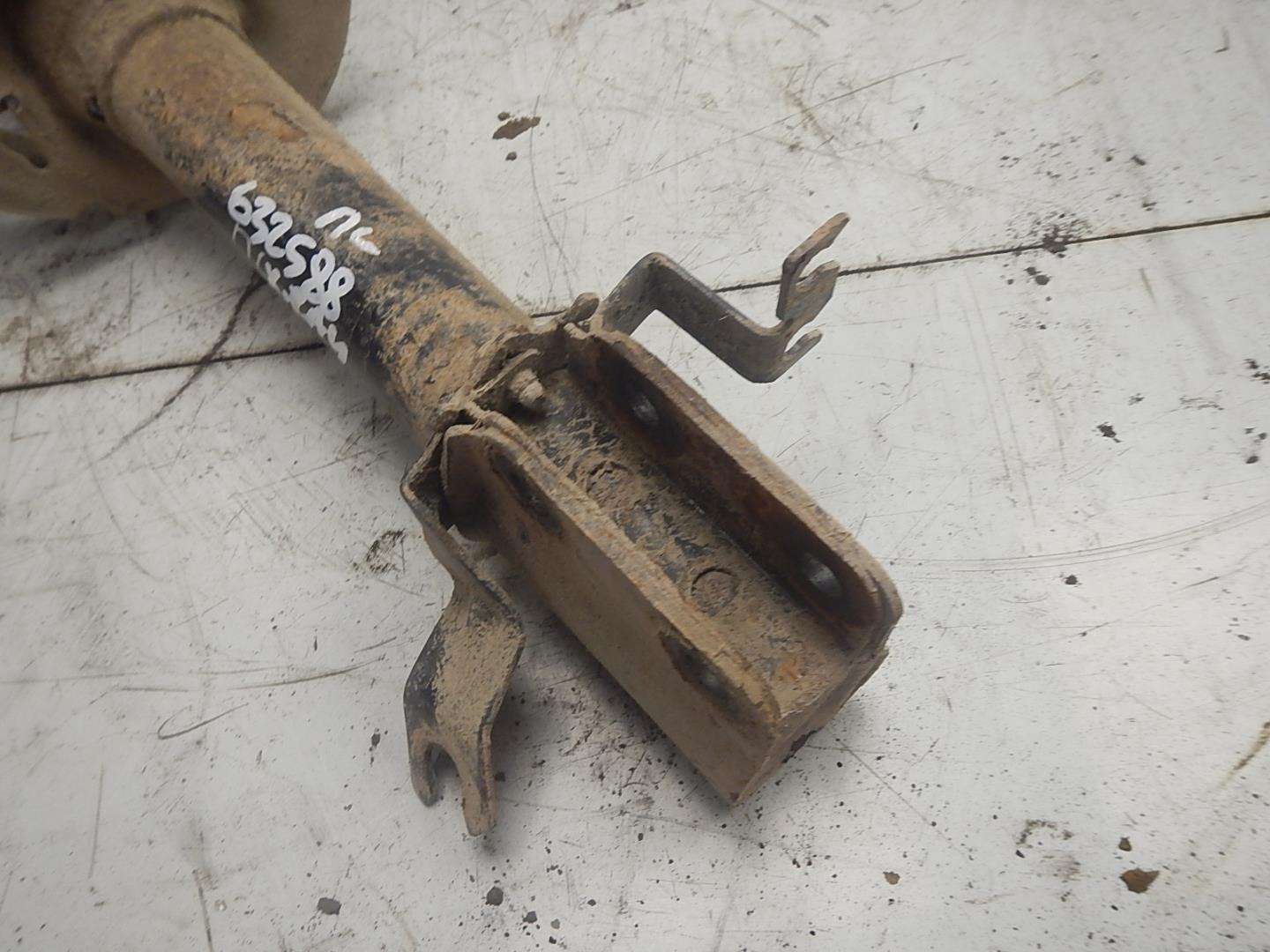 Амортизатор передний левый