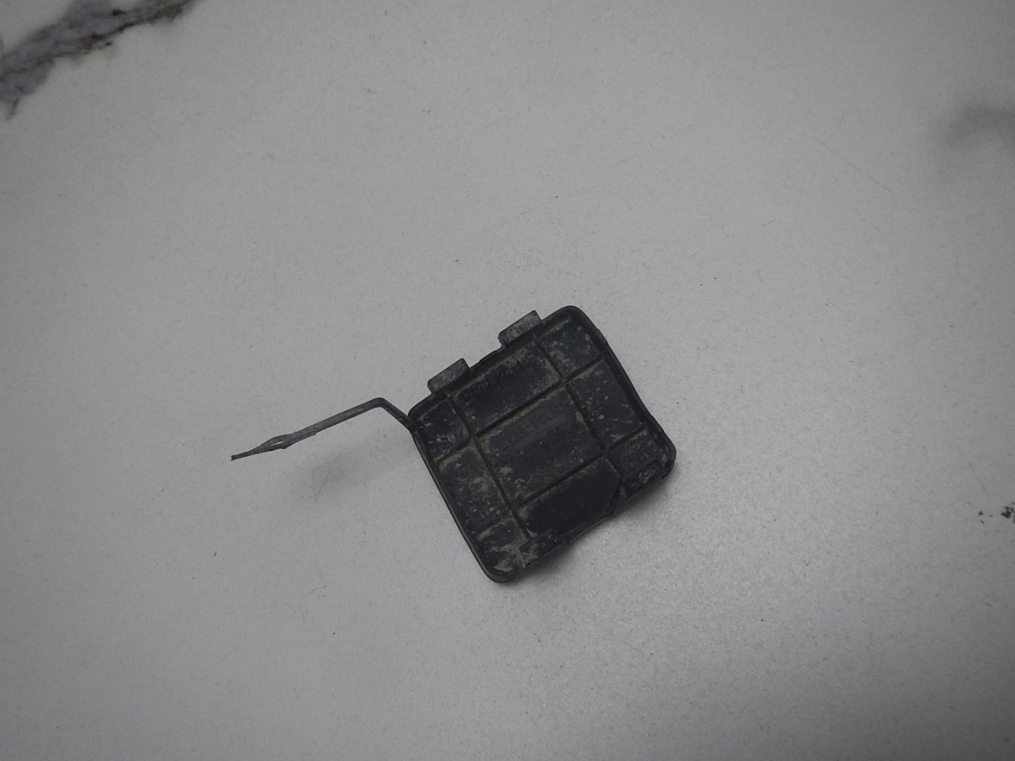 Заглушка буксировочного крюка