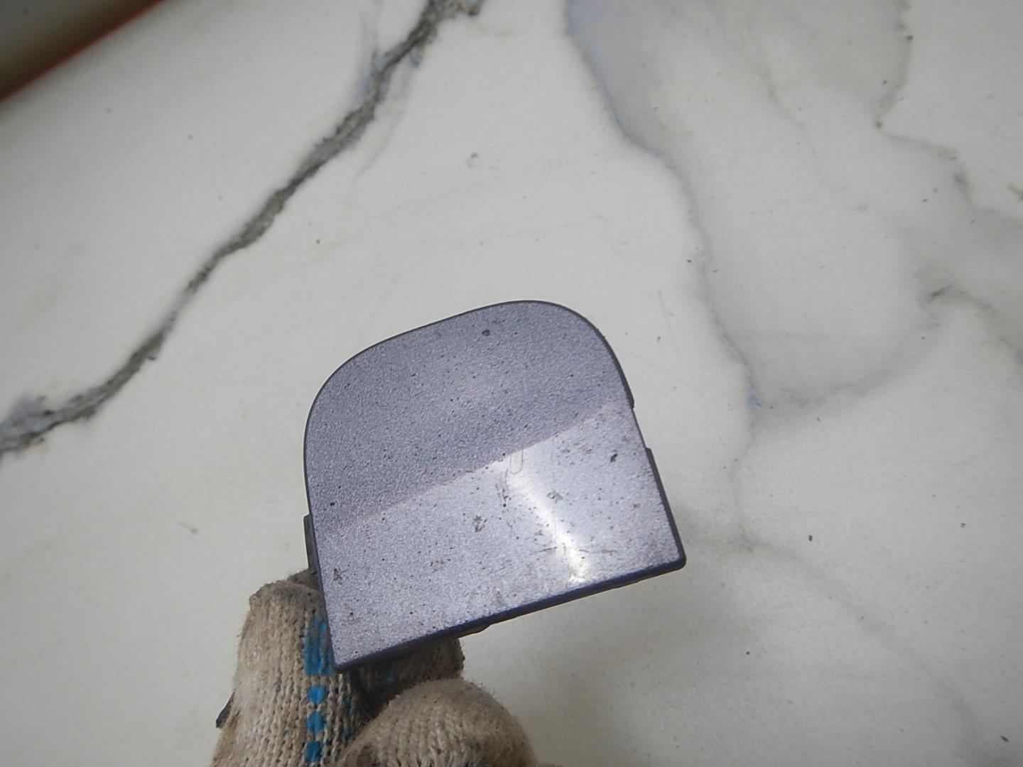 Заглушка буксировочного крюка