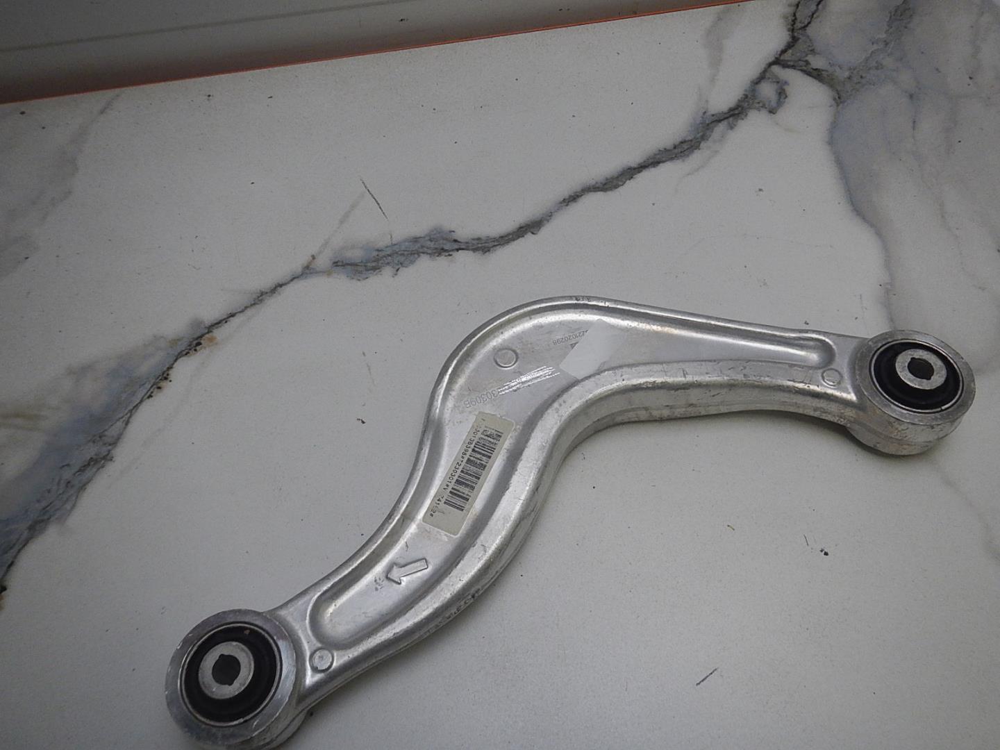 Рычаг задний верхний левый