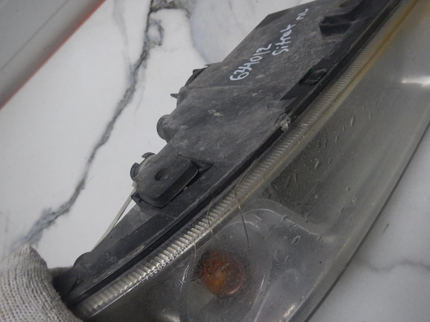 Фара противотуманная левая