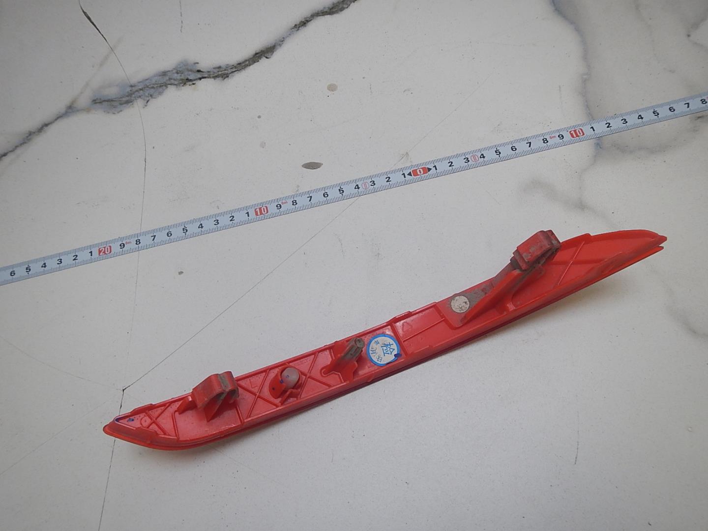 Отражатель в бампер задний левый