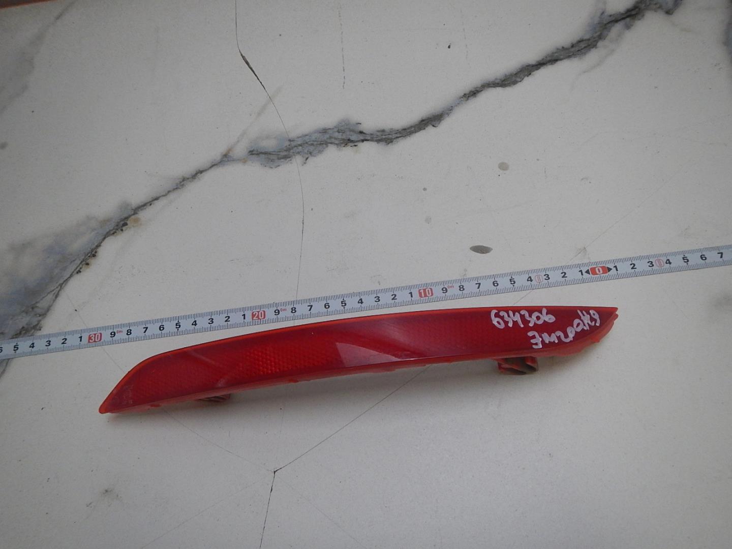 Отражатель в бампер задний левый