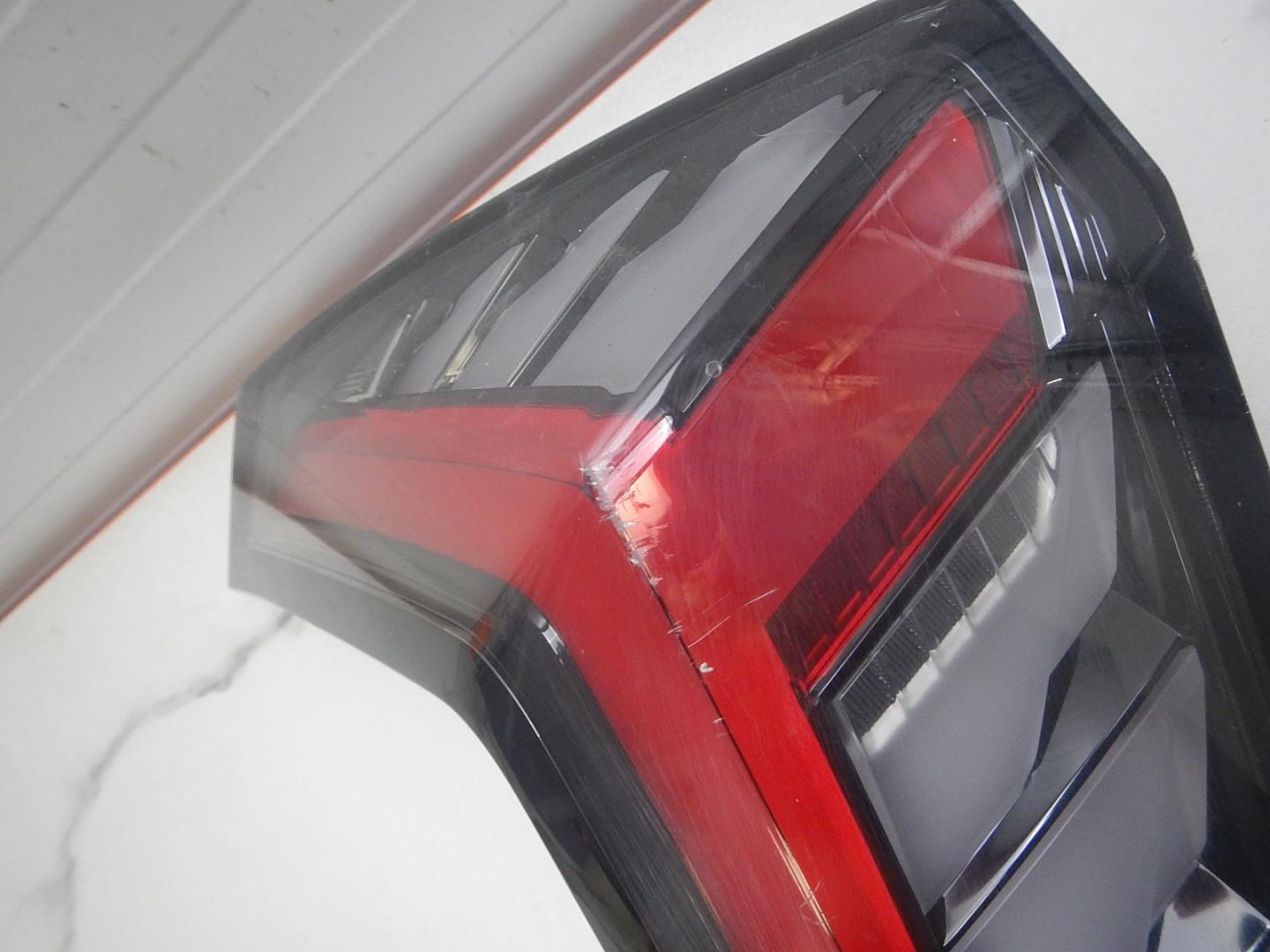 Фонарь задний левый