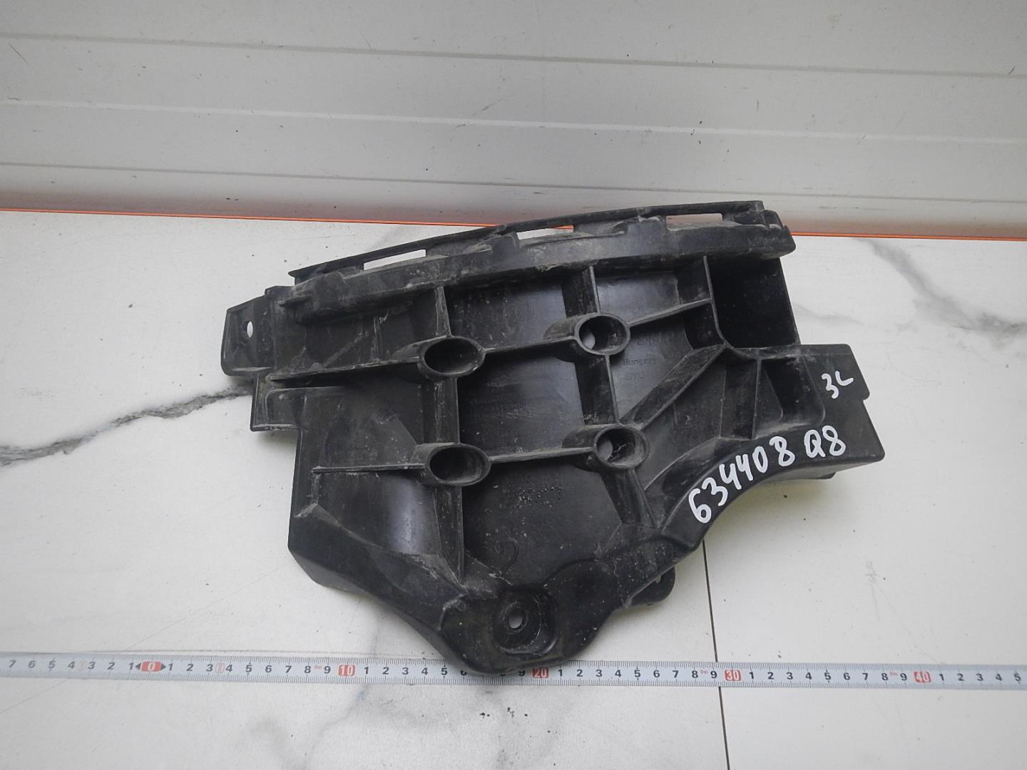 Кронштейн заднего бампера левый