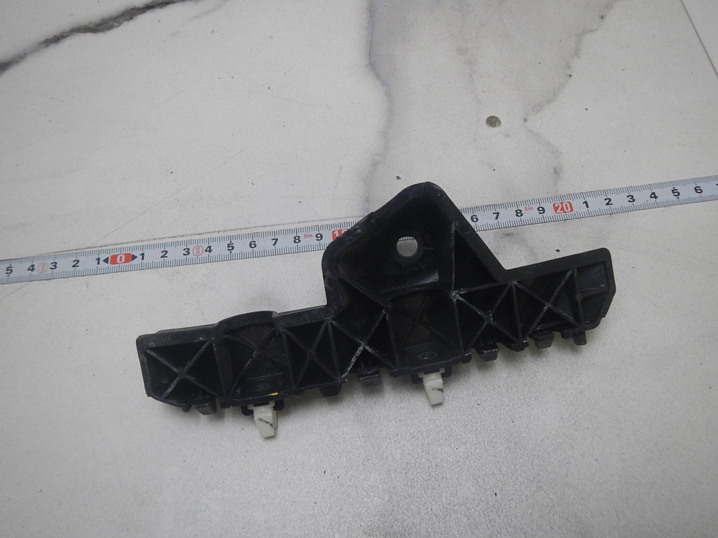 Кронштейн переднего бампера левый