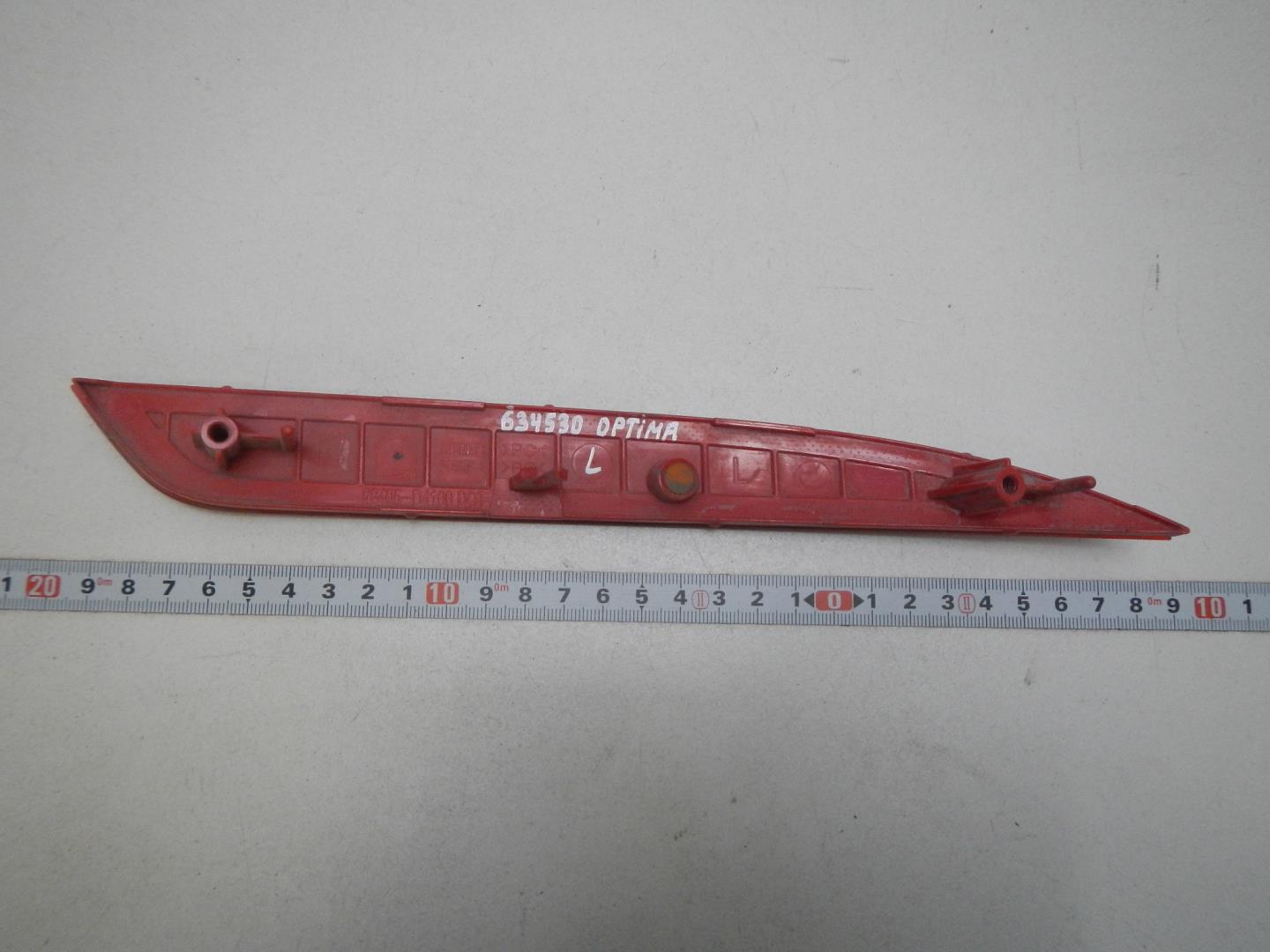 Отражатель в бампер задний левый