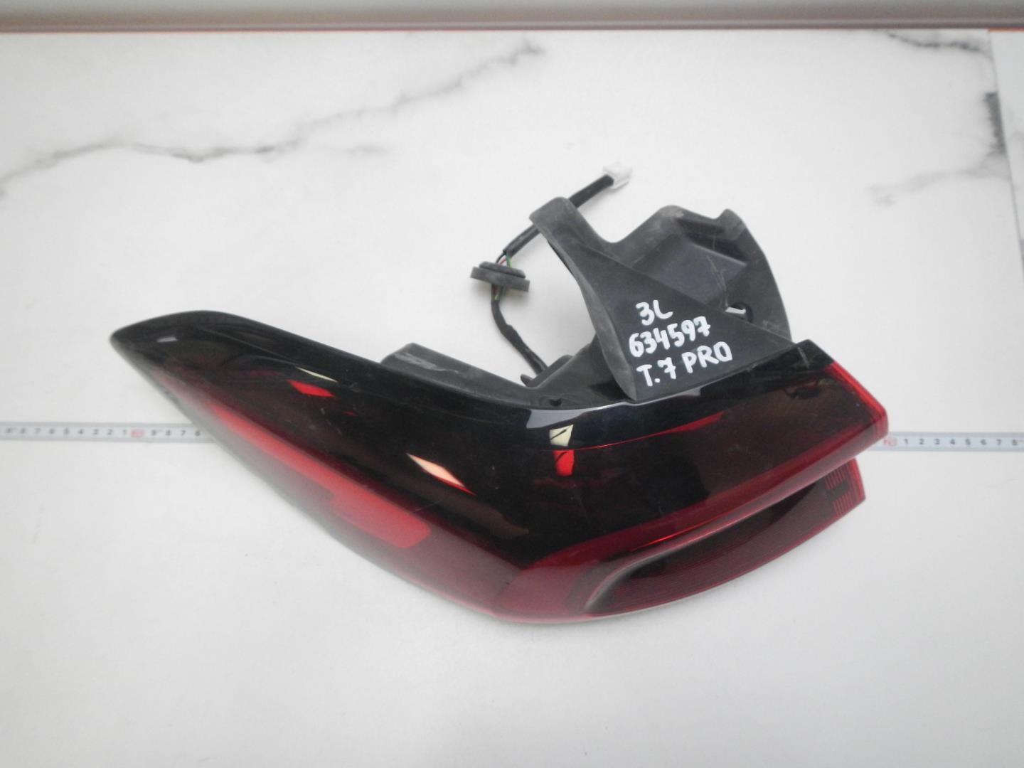 Фонарь задний левый