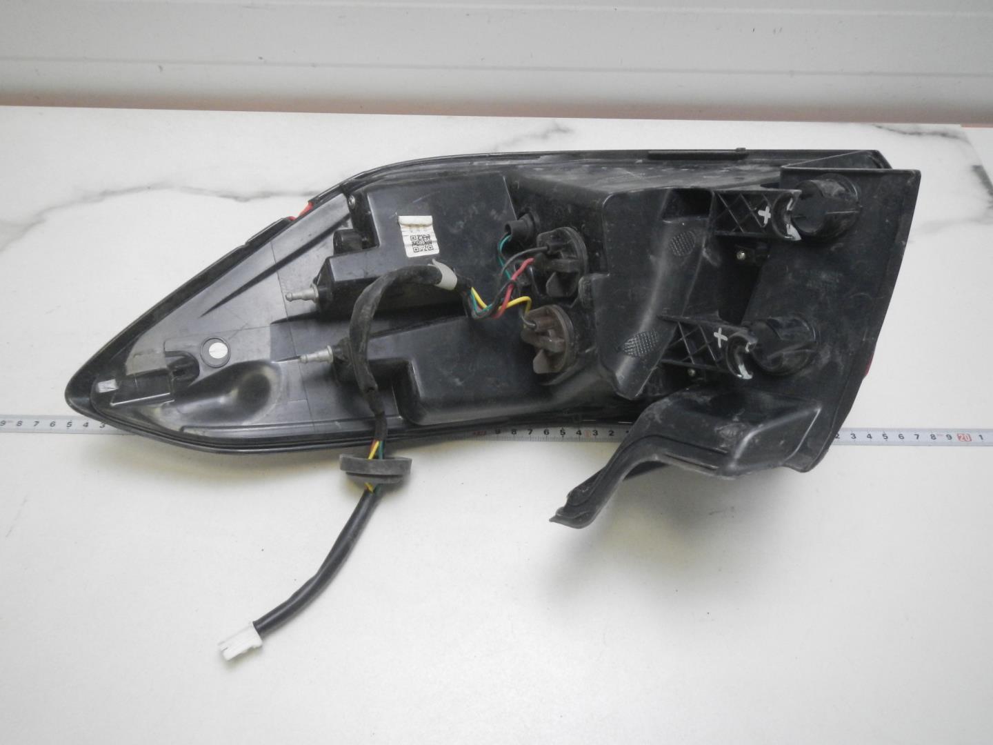 Фонарь задний левый