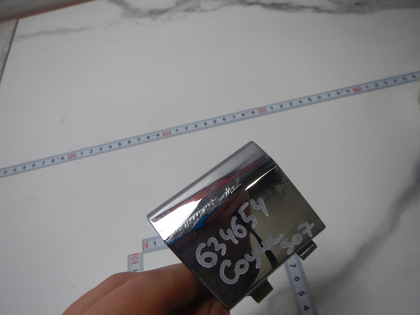 Заглушка буксировочного крюка