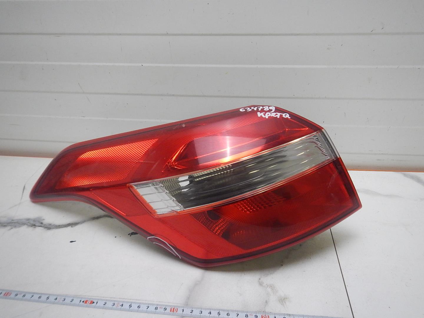 Фонарь задний левый