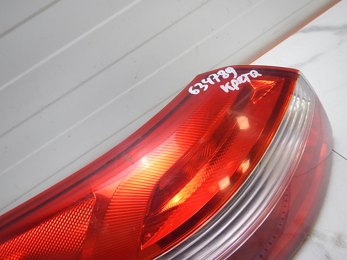 Фонарь задний левый