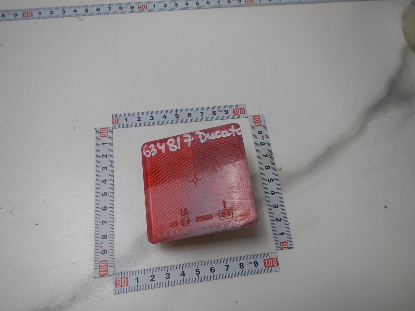 Отражатель в бампер задний левый