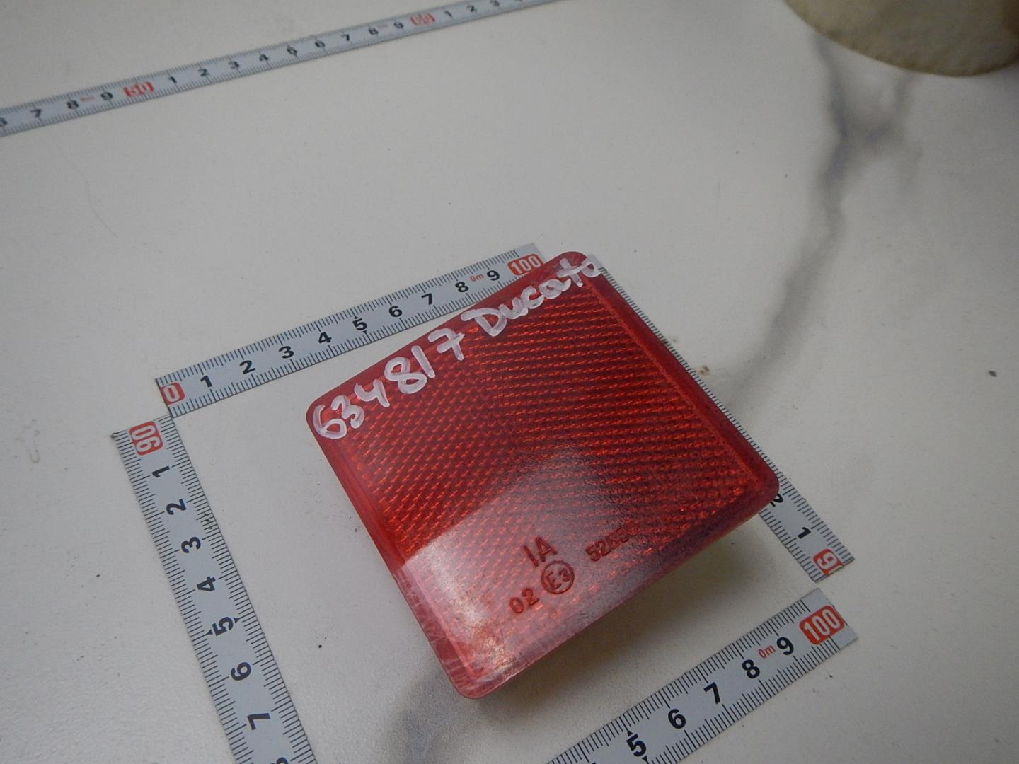 Отражатель в бампер задний левый