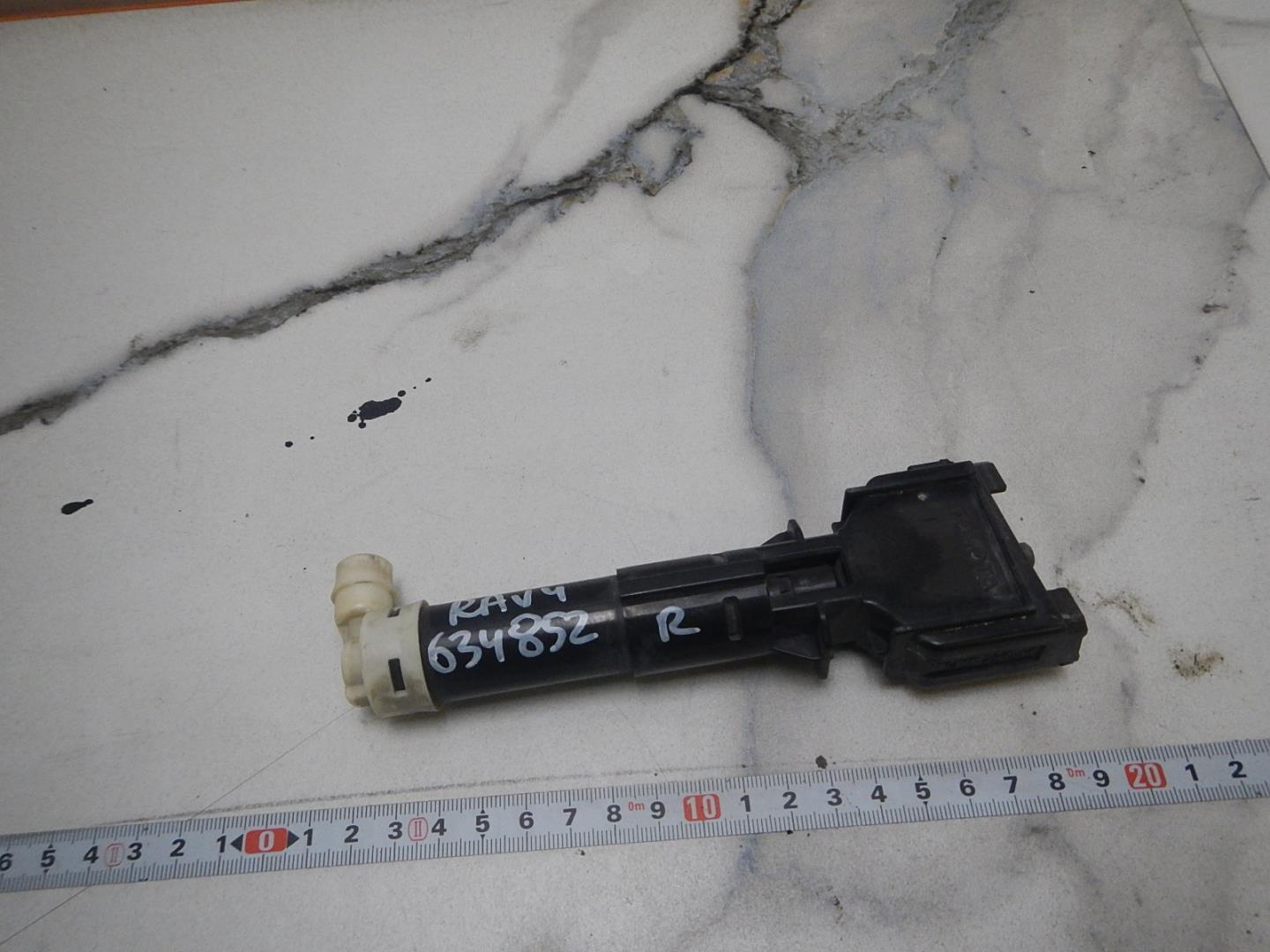 Форсунка омывателя фары