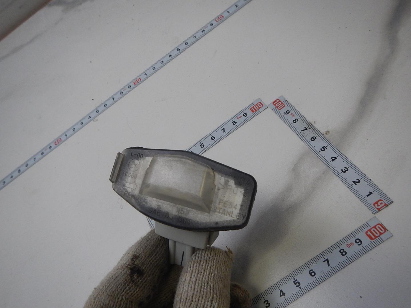 Фонарь подсветки номера