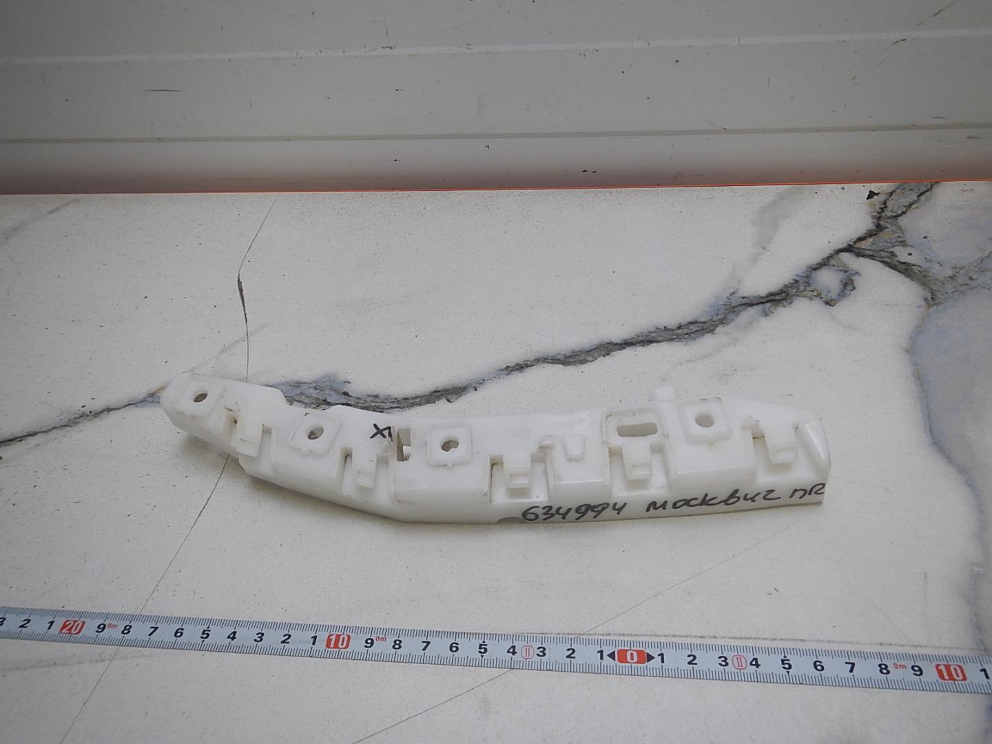 Кронштейн переднего бампера правый