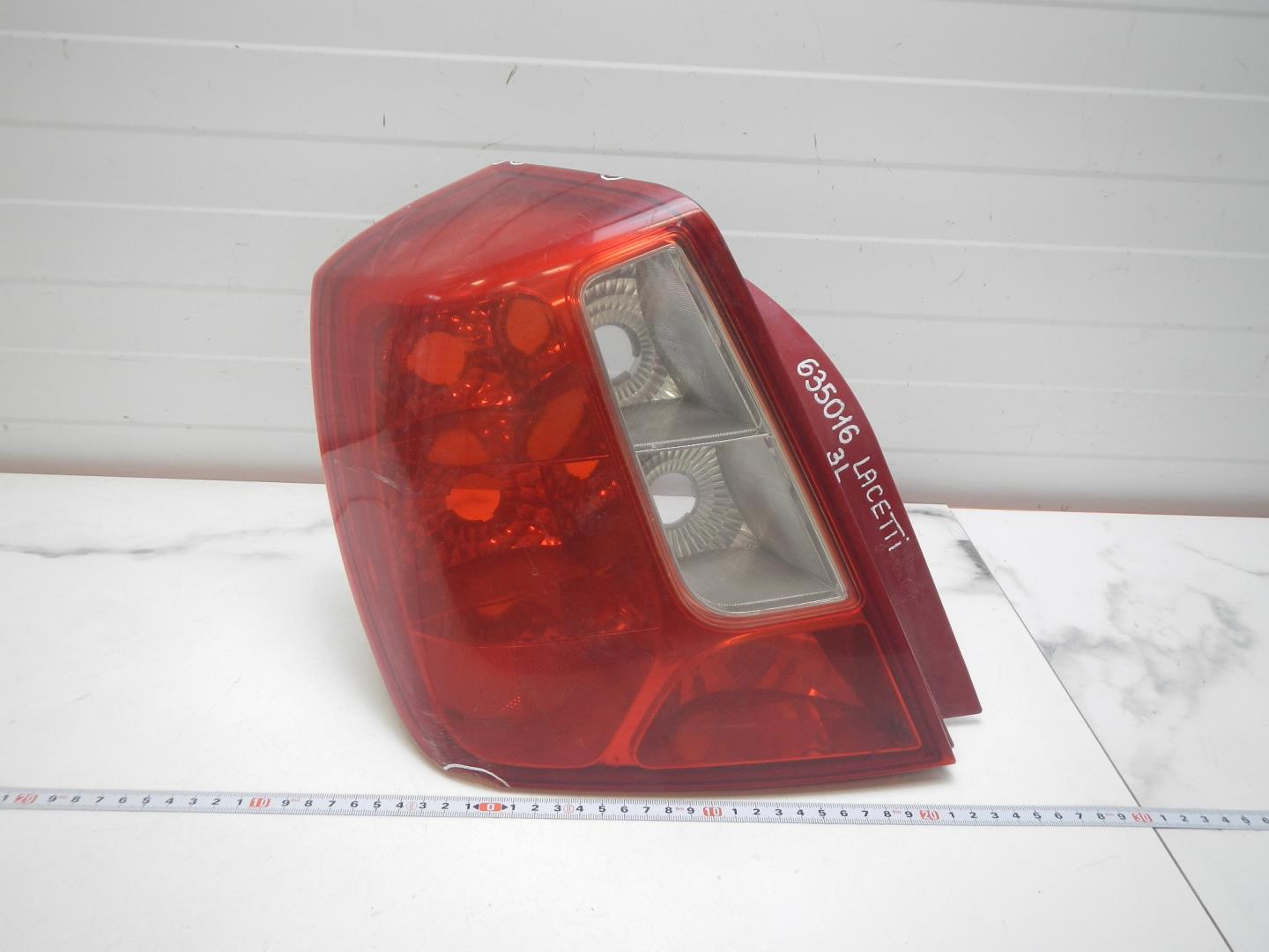 Фонарь задний левый