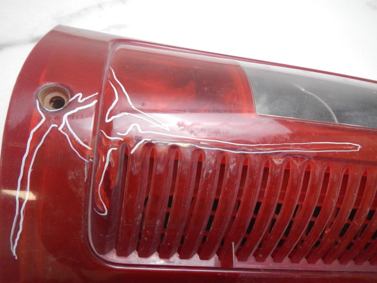 Фонарь задний левый