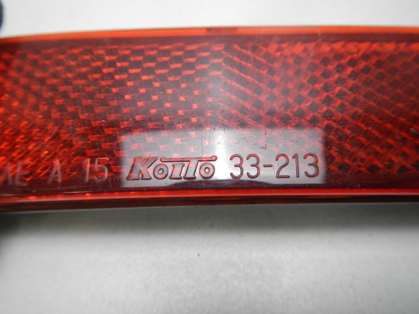 Отражатель в бампер задний левый