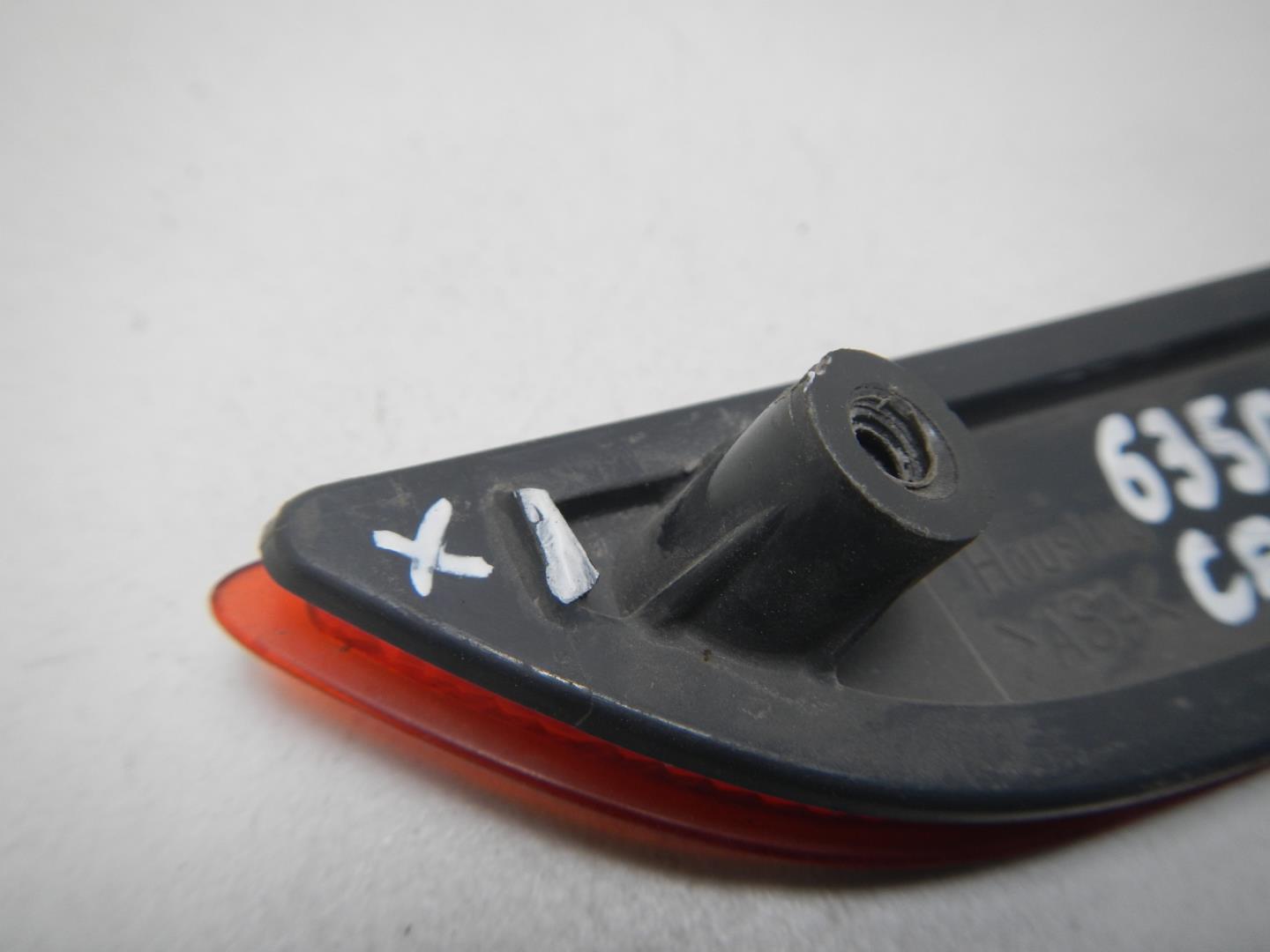 Отражатель в бампер задний левый