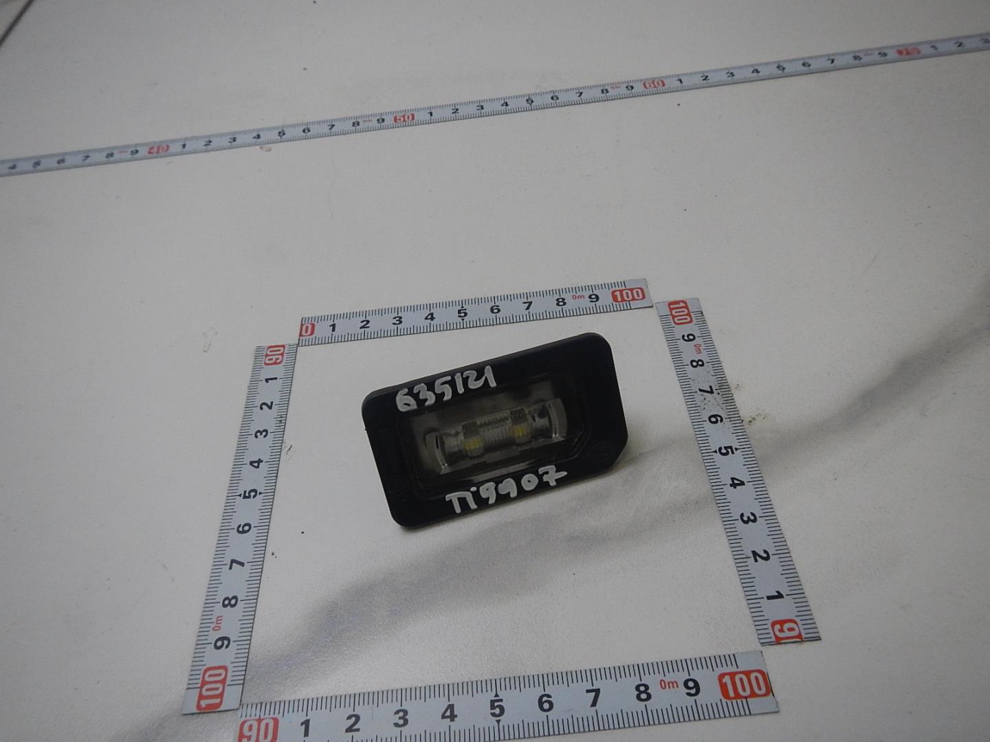 Фонарь подсветки номера