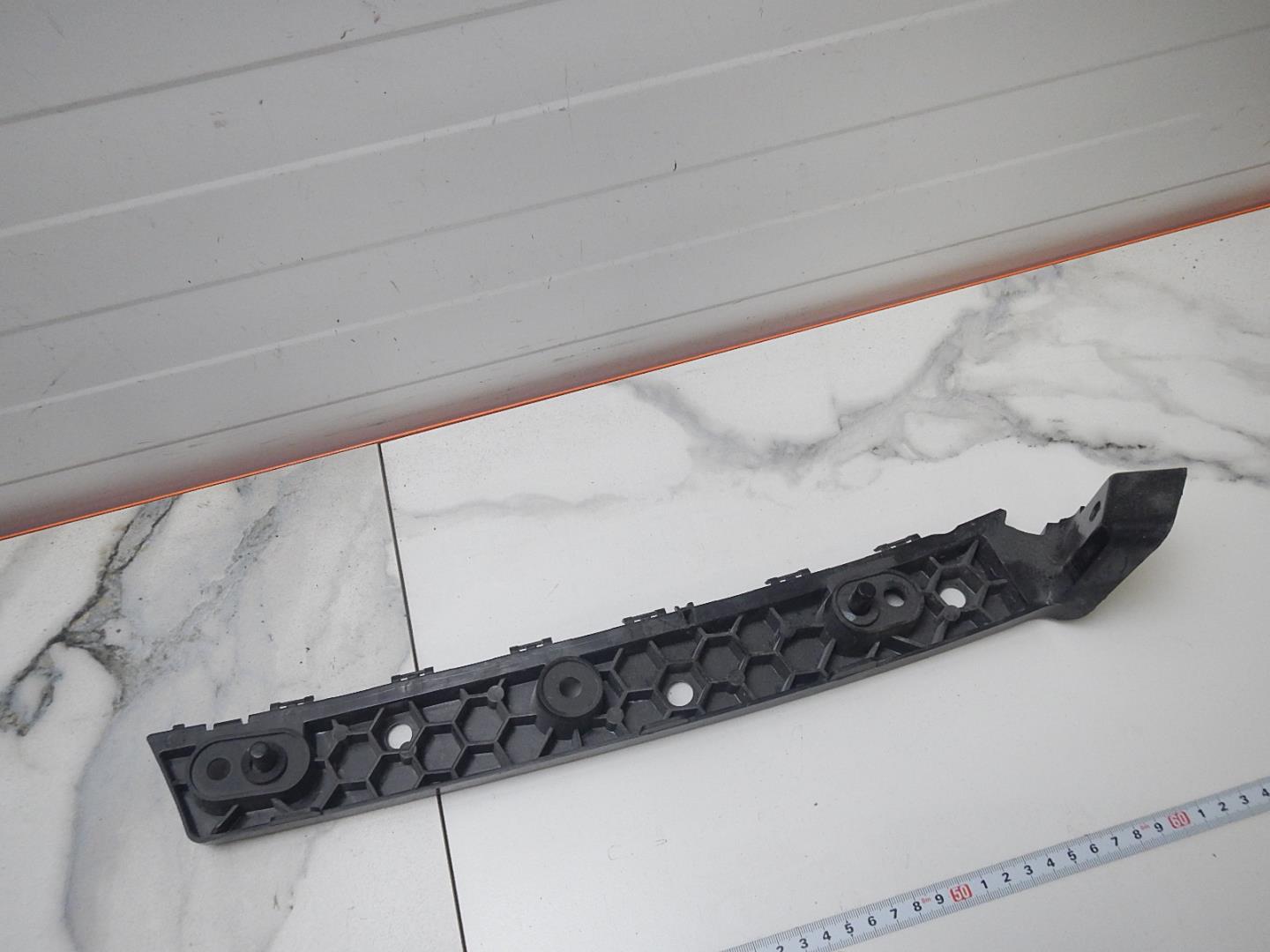 Кронштейн заднего бампера правый