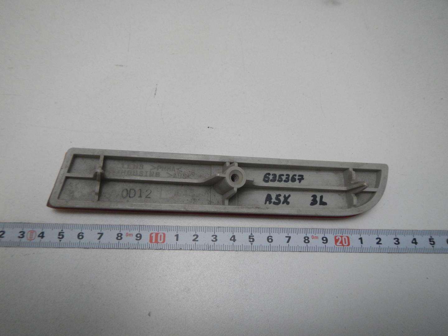 Отражатель в бампер задний левый