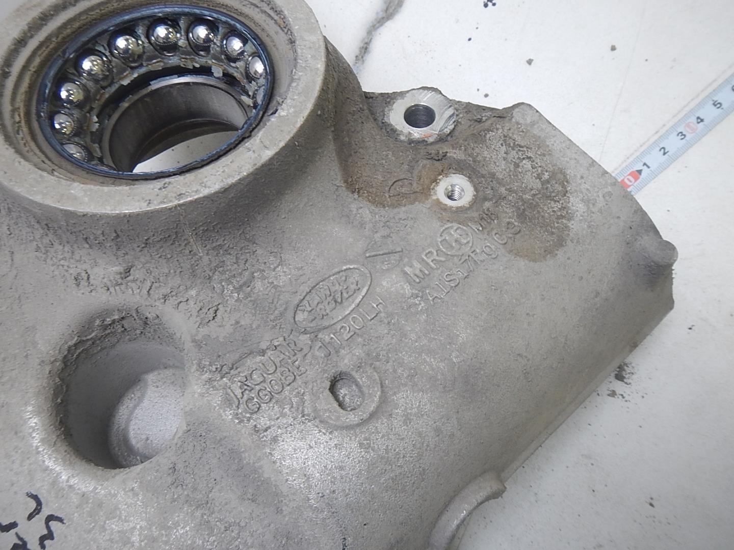 Кулак поворотный задний левый