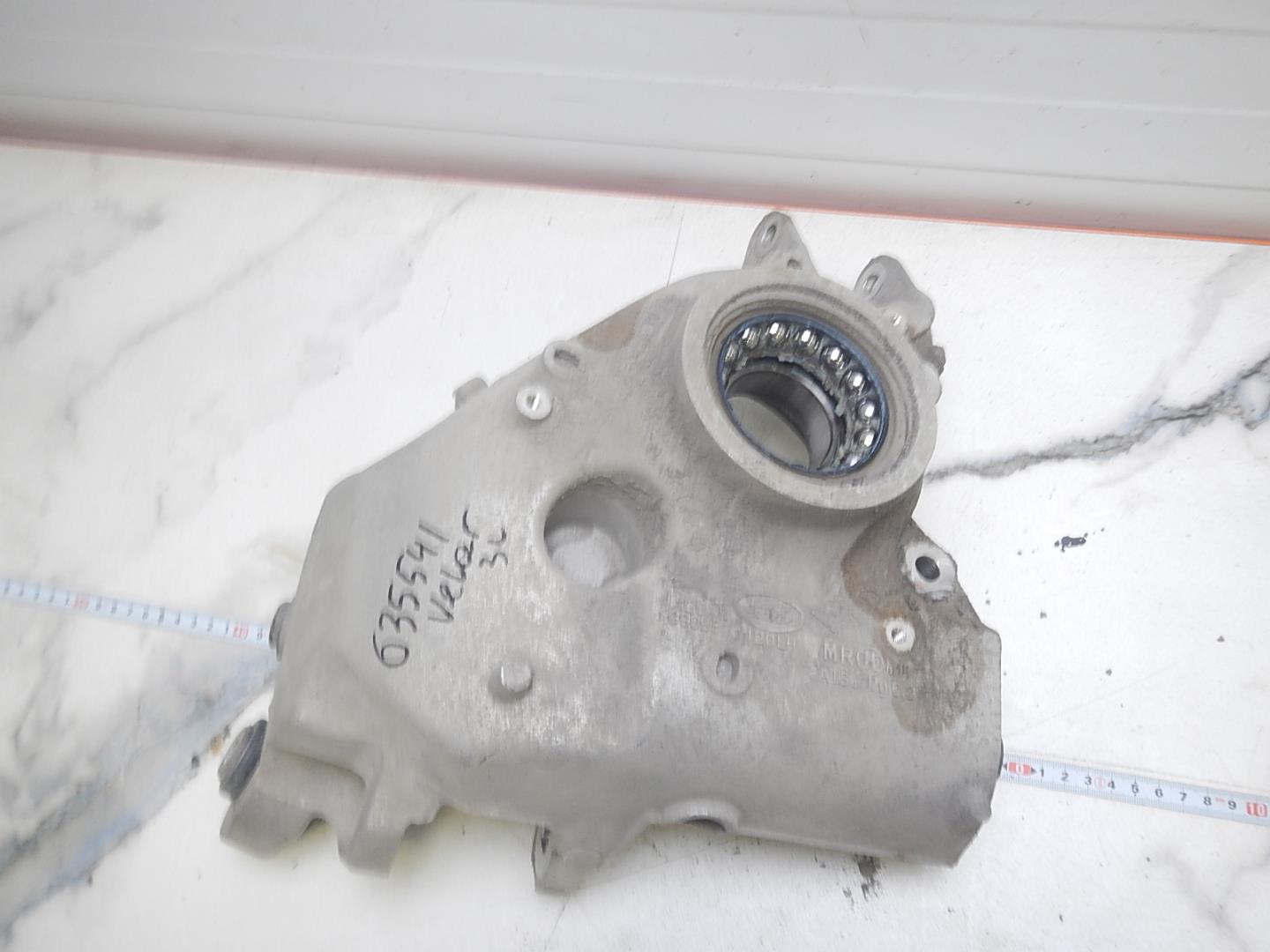 Кулак поворотный задний левый