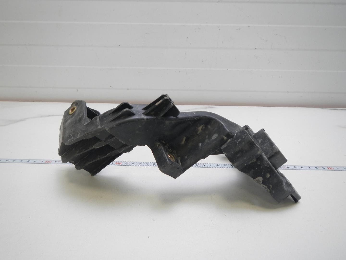 Кронштейн фар правый