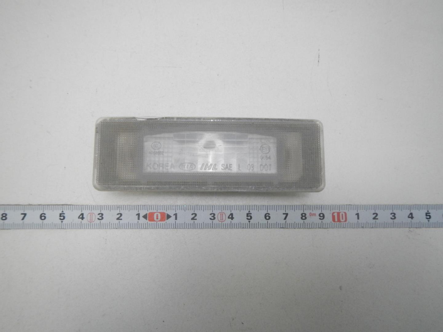 Фонарь подсветки номера