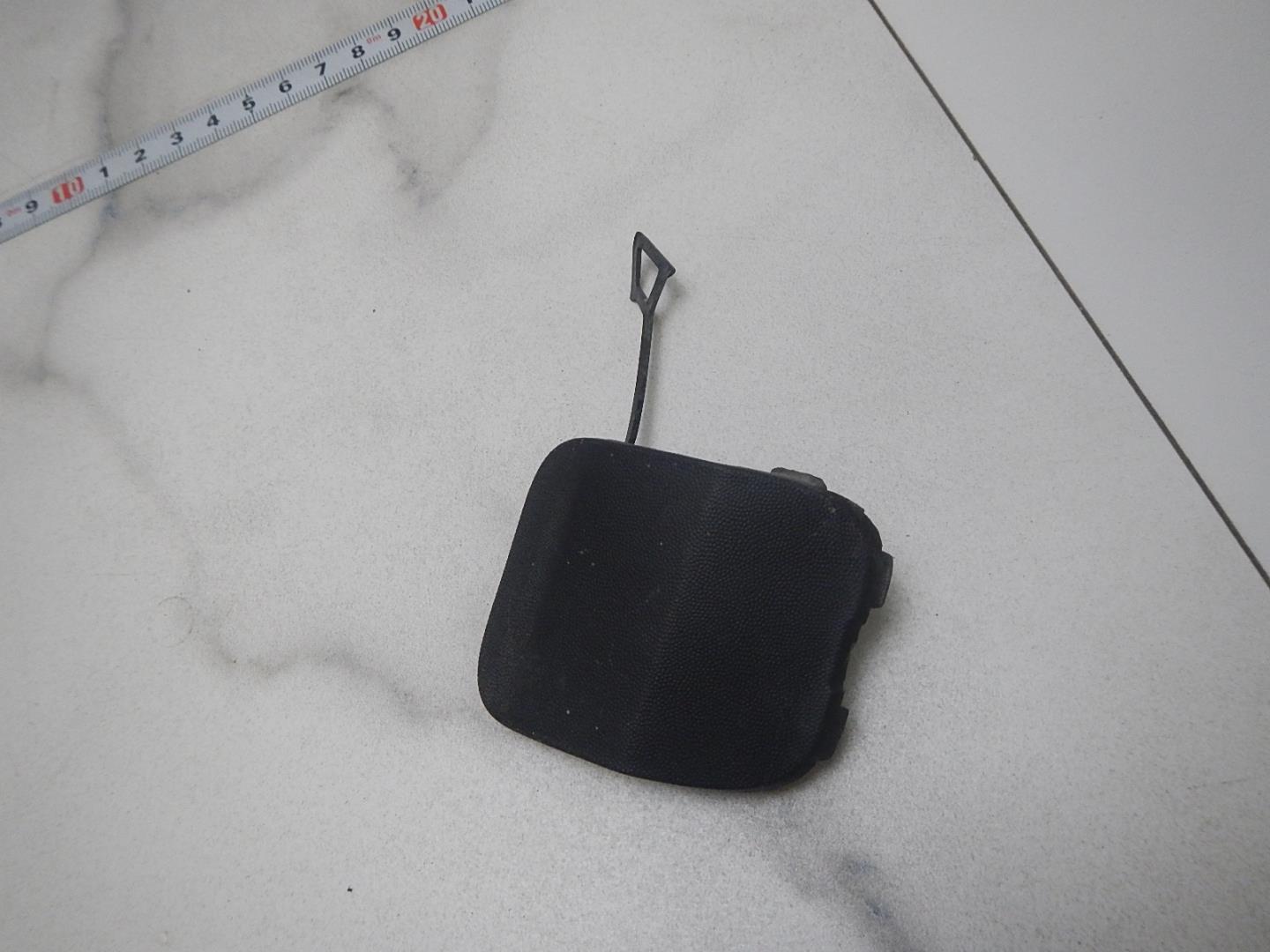 Заглушка буксировочного крюка