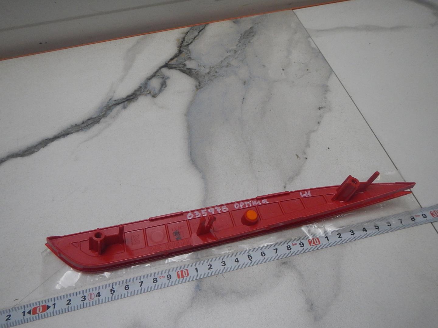 Отражатель в бампер задний левый