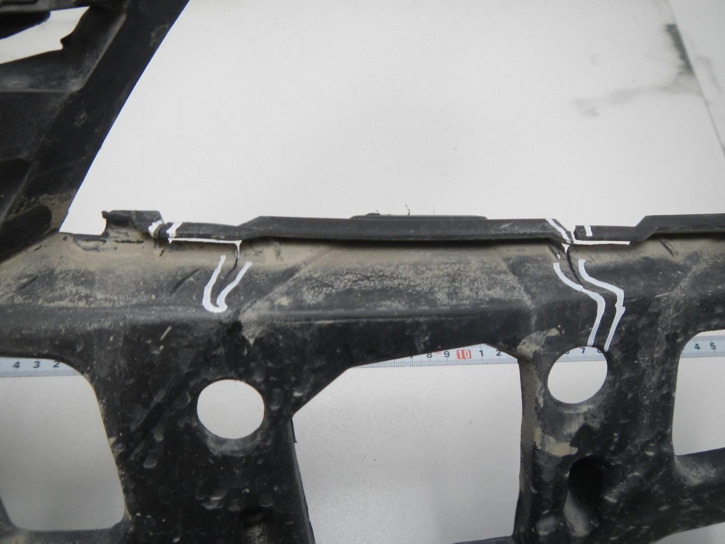 Кронштейн переднего бампера левый