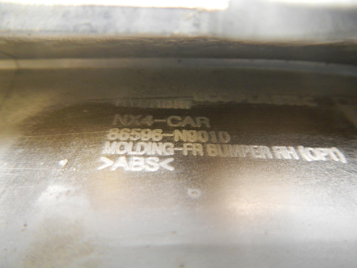 Молдинг переднего бампера правый