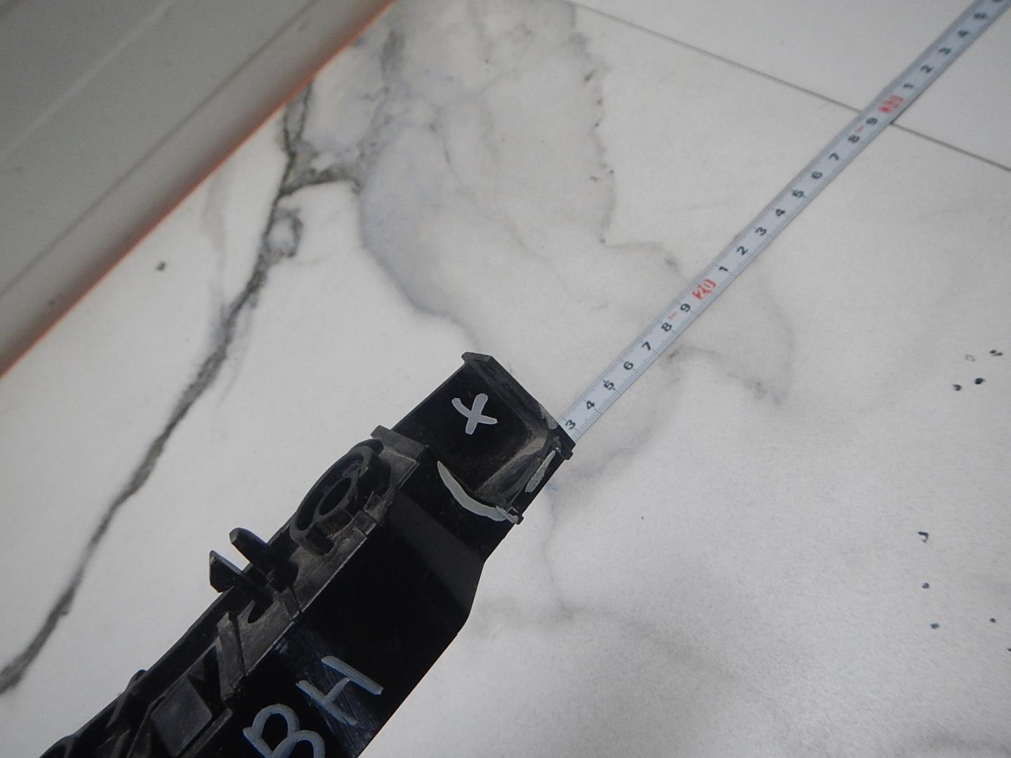 Кронштейн переднего бампера левый