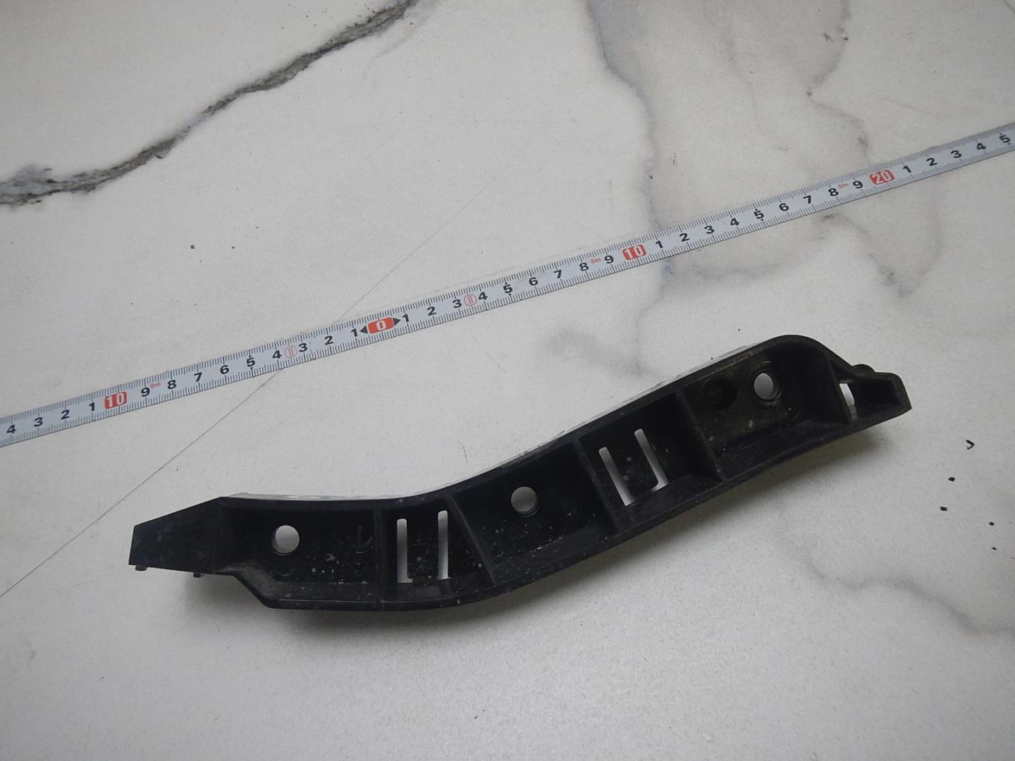 Кронштейн переднего бампера левый