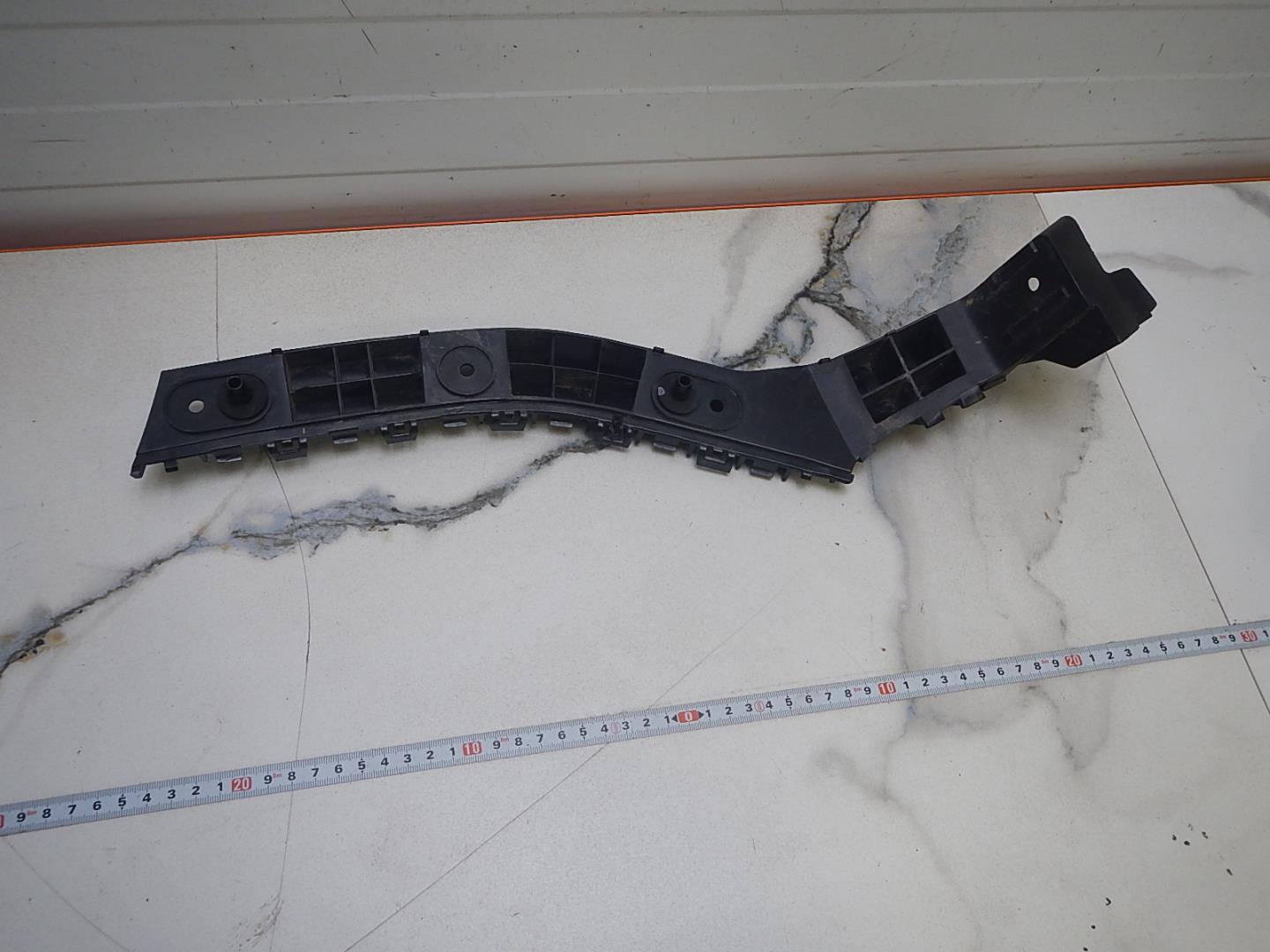 Кронштейн заднего бампера левый