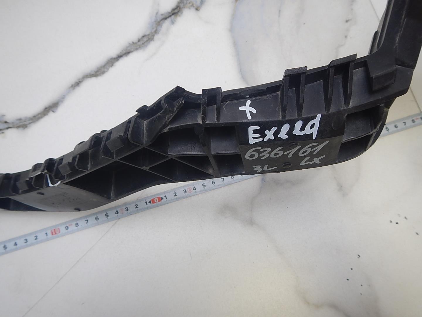 Кронштейн заднего бампера левый