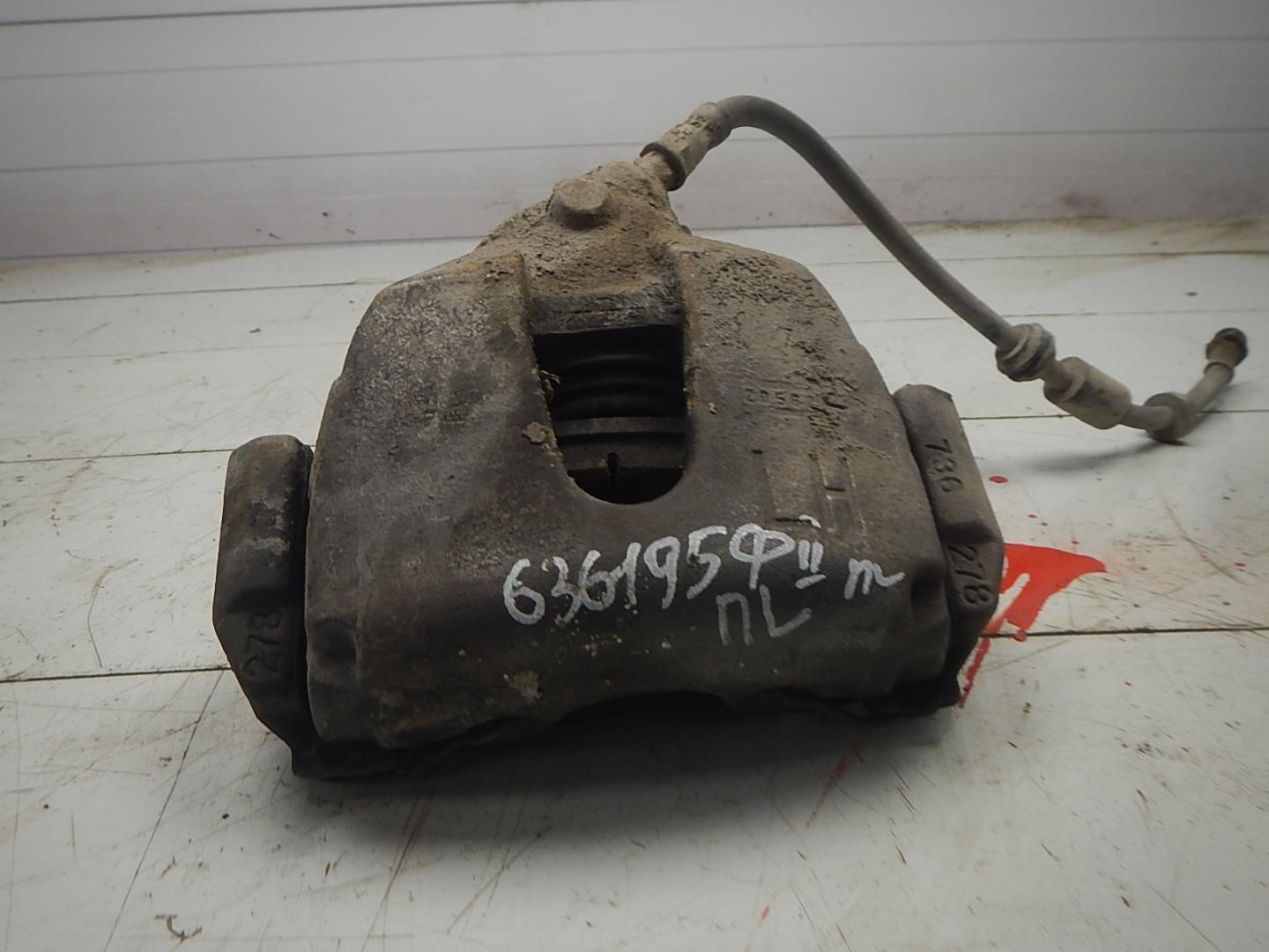 Суппорт передний левый