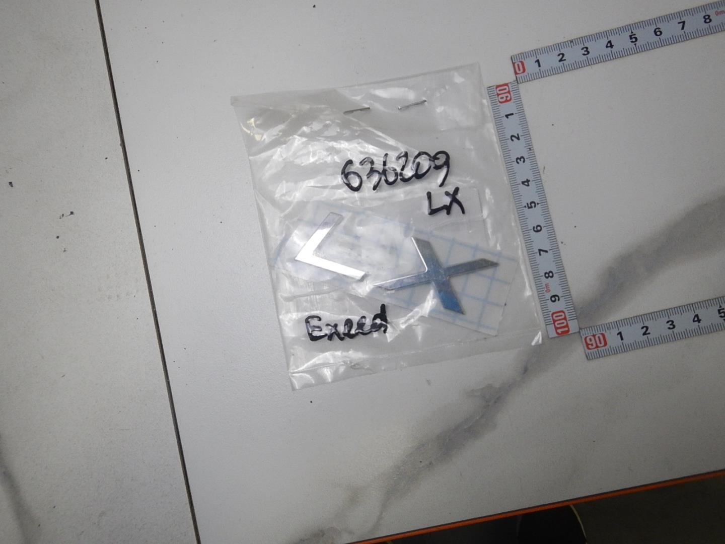 Эмблема на крышку багажника