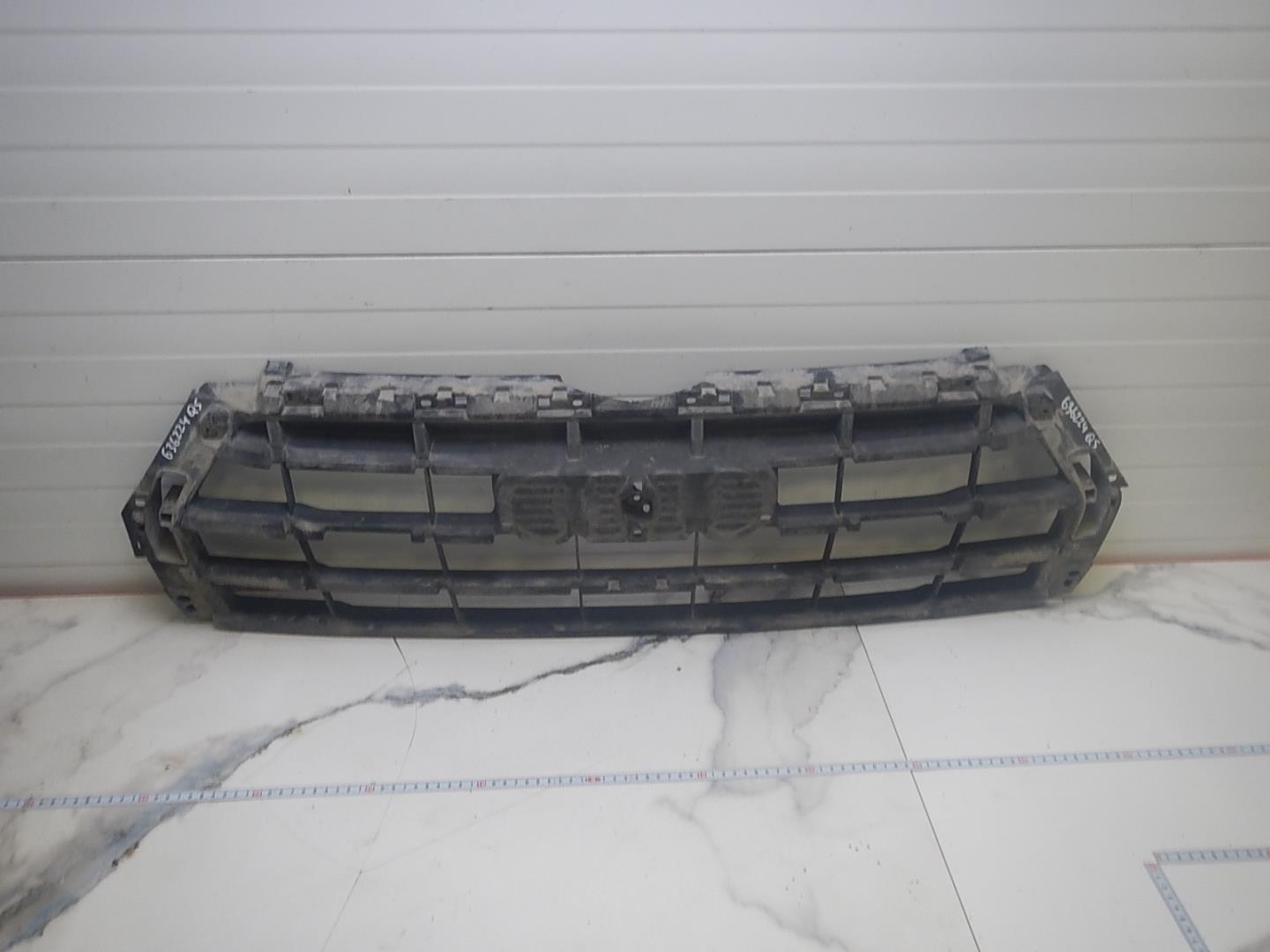 Кронштейн решетки радиатора