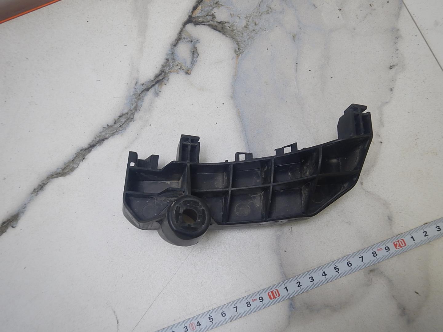 Кронштейн заднего бампера левый