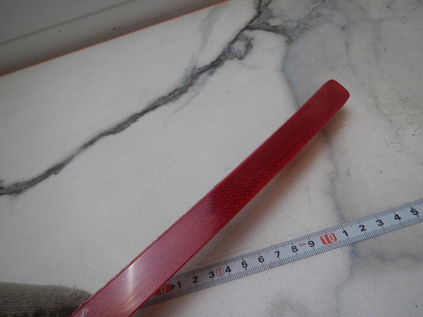 Отражатель в бампер задний левый