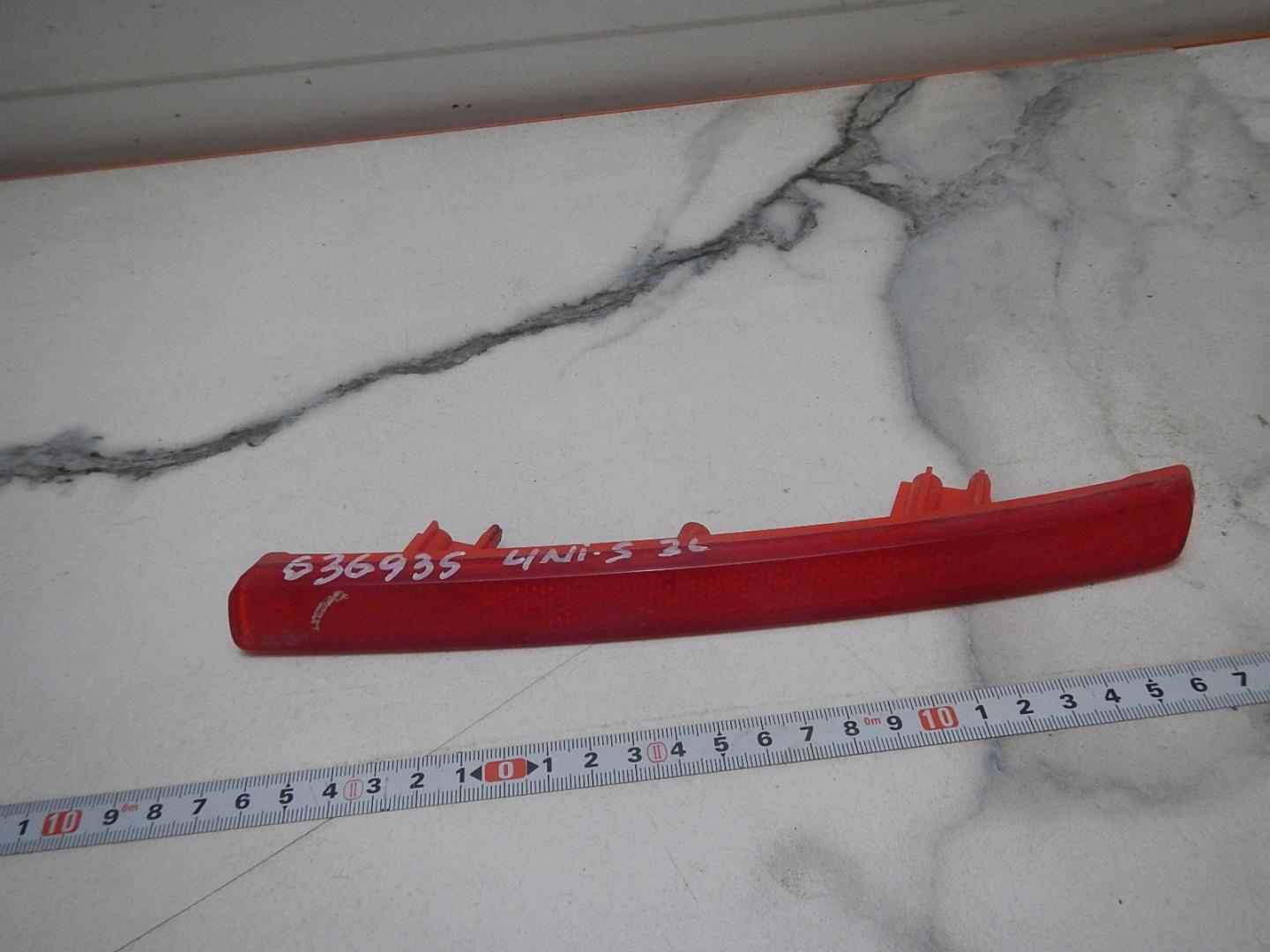 Отражатель в бампер задний левый