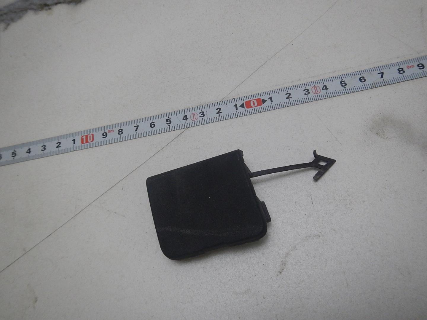 Заглушка буксировочного крюка