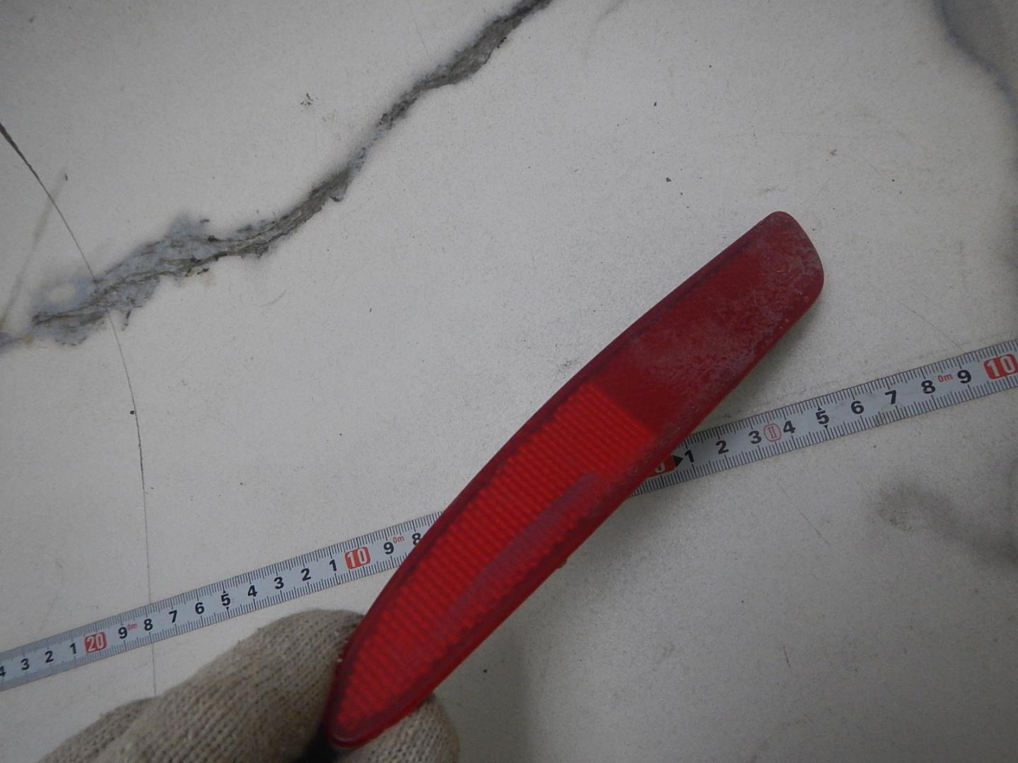 Отражатель в бампер задний левый