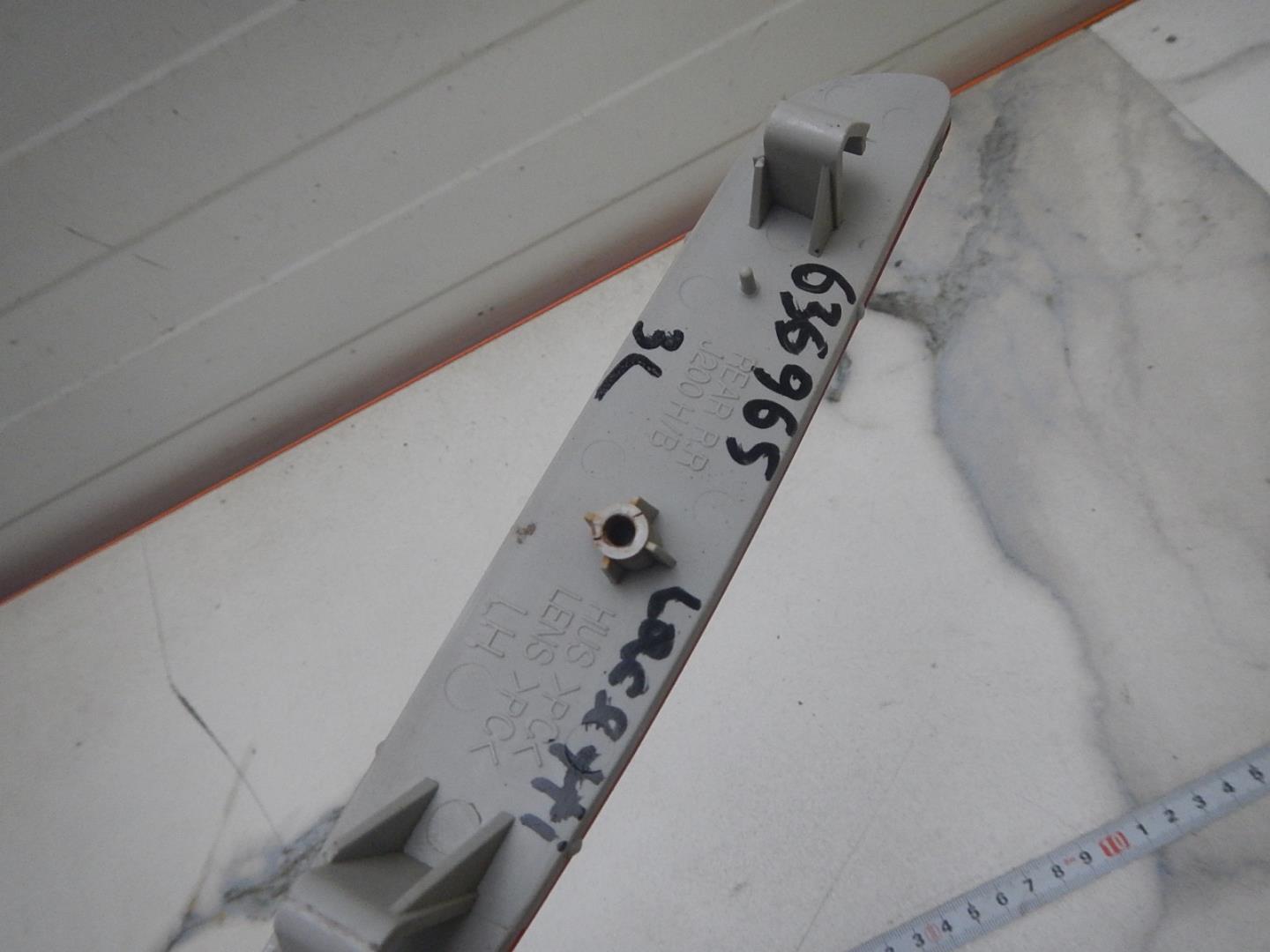 Отражатель в бампер задний левый