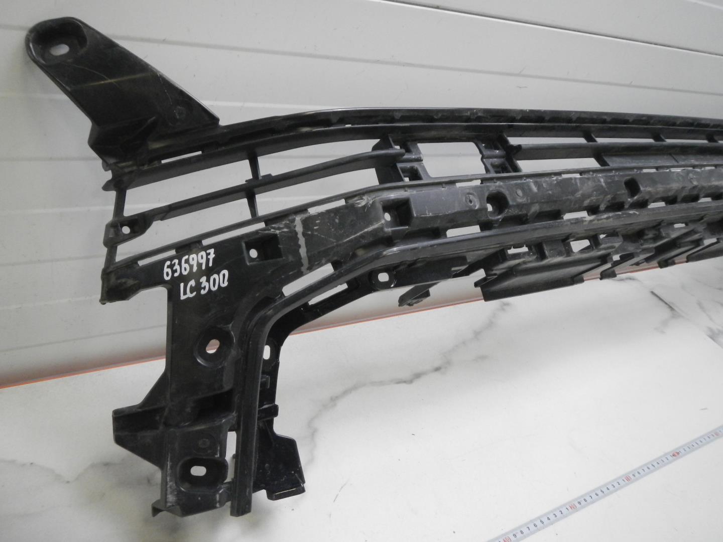 Кронштейн решетки радиатора